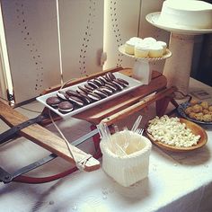 an assortment of desserts and pastries on a table