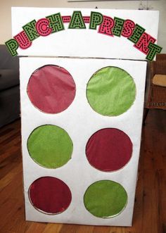 a cardboard box that is decorated with different colored circles and the words buchafrise on it