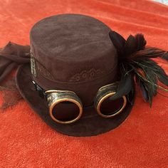 Steampunk Hat With Gears And Feather Embellishment - Nice Quality. Worn Only 1 For A Halloween Party. Gold And Brown Accent Details. No Odor- Like Brand New. I Will Ship With Care! Vintage Top Hat For Fall Party, Steampunk Hats, Winter Festival Vintage Mini Hats, Steampunk Brown High Crown Hat, Brown Steampunk Hat With High Crown, Steampunk Hats Women, Brown Steampunk Party Hat, Brown Steampunk Top Hat With High Crown, Brown Fitted Steampunk Top Hat