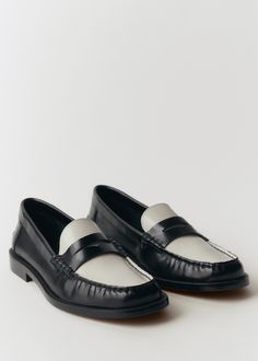 Two-tone leather loafers - Women | MANGO USA Workwear Slip-on Moccasins With Contrast Sole, Leather Loafers With Contrast Sole For Office, Office Loafers With Contrast Sole In Calf Leather, Office Calf Leather Loafers With Contrast Sole, Modern Pointed Toe Loafers With Stitched Sole, Office Loafers With Contrast Sole And Round Toe, Slip-on Loafers With Contrast Sole In Calf Leather, Classic Platform Loafers With Contrast Sole For Work, Slip-on Calf Leather Loafers With Contrast Sole