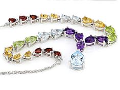 2.90ctw Pear Shape Glacier Topaz™, 1.24ctw Pear Shape Vermelho Garnet™, 1.38ctw Pear Shape Citrine, 1.58ctw Pear Shape Manchurian Peridot™ And 1.48ctw Pear Shape Amethyst Rhodium Over Sterling Silver 18" Necklace. Drop Measures Approximately 0.75"L x 0.27"W. Lobster Claw Clasp. 2" Extender. Multicolor Pear-shaped Gemstone Jewelry, Multi Stone, Sterling Silver Necklace, Pear Shape, Lobster Claw, Pear Shaped, Sterling Silver Necklaces, Citrine, Garnet