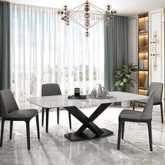 a dining room table with four chairs around it