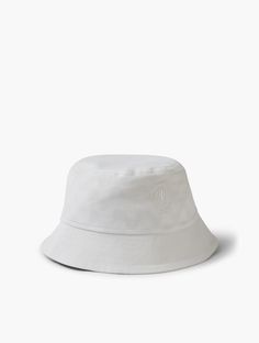 An essential for sunseekers, our Leandro Bucket Hat offers easy, on-the-go protection from the sun. Crafted in a 100% cotton canvas, our bucket hats are finished with subtle tonal embroidery. ---TabsTITLE: DescriptionTEXT: 100% Cotton CanvasEmbroidered logoInternal brow band6cm wide brimOne size fits allMade in the EU White Bucket Hat, Beach Hammock, Tonal Embroidery, Bucket Hat White, Terry Towel, Print Trends, Espadrille Sandals, Linen Towels, Bucket Hats