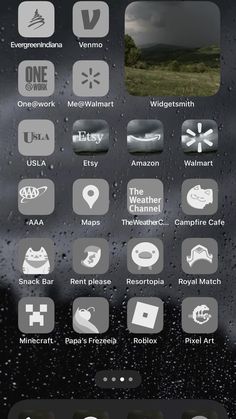 an iphone screen showing the weather and icons on it, including raindrops in the background