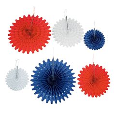 six red, white and blue paper fans hanging from hooks