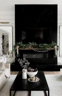 Follow the link 8 Best Christmas GiftsChristmas decor ideas for tv console Minimalist Christmas Decor, Black And White Living Room, Black Fireplace, Christmas Mantle Decor, Christmas Fireplace Decor, Christmas Mantel Decorations, Christmas Mantle, Tv Decor, Living Room Tv Stand