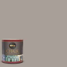 a can of chalk paint on an orange background