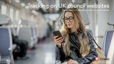 a woman sitting on a train looking at her cell phone and texting to track on uk council website