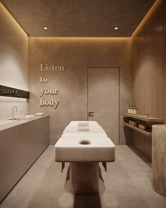 a spa room with a large white table