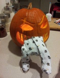 there is a pumpkin that has been carved into the shape of a jack - o'- lantern