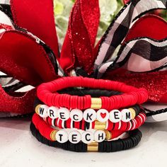 When it’s time to show your Red Raider pride, don’t settle for just any old ordinary piece of team swag - wear this Texas Tech Bracelet Set! This unique and spirited set comes with five handmade bracelets, made for those special Red Raiders who want to shout their loyalty from the rooftops. It's an easy way to display your school spirit and amaze your friends - Wreck ‘Em Tech!Made with stretchy material, these bracelets provide maximum comfort and convenience. Not only that, but perfect accessor Red Stacked Beaded Bracelets For Gifts, Red Stacked Beaded Bracelets As Gift, Adjustable Stacked Red Bracelets, Red Adjustable Stacked Bracelets, Customized Red Wristband For Friendship, Red Team Spirit Bracelets For Gifts, Red Personalized Bracelets For Team Spirit, Personalized Red Bracelets For Team Spirit, Red Personalized Bracelets With Team Spirit Style