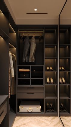 a walk in closet filled with lots of drawers and shoes on top of it's shelves