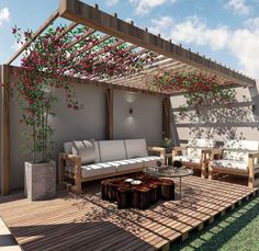 an outdoor living area with couches, tables and flowers on the pergolated roof