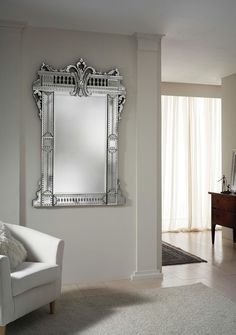 a mirror hanging on the wall in a living room