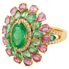 This ring has been meticulously crafted from 14-karat gold. It is hand set with 3.56 carats emerald, 2.14 carats pink sapphire & .36 carats of sparkling diamonds. The ring is a size 7 and may be resized to larger or smaller upon request. FOLLOW MEGHNA JEWELS storefront to view the latest collection & exclusive pieces. Meghna Jewels is proudly rated as a Top Seller on 1stDibs with 5 star customer reviews. All items manufactured by us are handmade and can be customized or redesigned. Composition Size-US-7 Total Weight-7.718 Gold Weight (Gms)-6.50 Diamond Wt(Cts)-0.36 Emerald Wt(Cts)-3.56 Sapphire Wt(Cts2)-2.14 Sapphire Cocktail Ring, Victorian Rings, Gold Flower, Blake Lively, Top Seller, Love Ring, Natural Emerald, Emerald Diamond, Sapphire Diamond