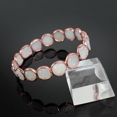 "GemFormingStudio D E T A I L S White Druzy Bangle | Multi Gemstone Bangle | Cute Bangle | Handmade Bangle | Bangle For Women | Bangle For Her, Gift For Women, Gift For Her Stone Size: 10 mm Weight: 15.98 gm Length: 2.5\" Aprx. Color: Rose Gold Material: Brass Polish: All Polish Available . Contact us for wholesale prices. R I N G S https://www.etsy.com/in-en/shop/GemFormingStudio?section_id=22783374 B E A D S https://www.etsy.com/in-en/shop/GemFormingStudio?section_id=22828835 W A N D S https:/ Adjustable Stackable Crystal Bracelet, Adjustable Stackable Round Crystal Bracelet, Adjustable White Round Cuff Bracelet, Adjustable Rose Gold Crystal Bangle Bracelet, Adjustable Rose Gold Round Crystal Bracelet, Round Hypoallergenic Rose Gold Bracelets, Adjustable Round Rose Gold Crystal Bracelet, Rose Gold Bangle Bracelets For Jewelry Making, Hypoallergenic Round Rose Gold Bracelets