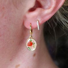 These earrings feature vintage 15x10mm gold plated and enamel floral charms. The earrings are 24k gold plated copper and are tarnish-resistant. Hoops are approx 11mm. Gold Enamel Flower Earrings For Gift, Gold Enamel Hoop Earrings Gift, Gold Enamel Earrings With Flower Charm, Gold Earrings With Flower Charm In Enamel, Gold Earrings With Flower Charm And Enamel, Gold Enamel Flower Earrings, Ring Necklace, Vintage Floral, Pink Flowers