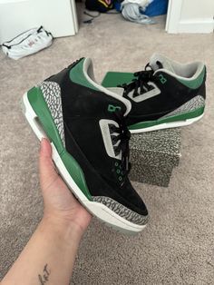 Elevate your sneaker game with these stylish Jordan 3 Retro Mid Pine Green shoes. The vibrant green colorway is sure to turn heads and make a statement wherever you go. A classic design with modern updates, these shoes offer both comfort and style. Perfect for any fashion-forward sneakerhead, these Jordans are a must-have for your collection. Get ready to step out in style with the Jordan 3 Retro Mid Pine Green shoes. Jordan 3 Pine Green, Jordan 3 Retro, Sneaker Games, Pine Green, Jordan 3, Green Shoes, Vibrant Green, Sneaker Head, Classic Design