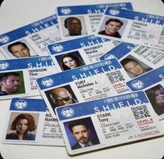 several id cards with photos of actors on them, all in different colors and sizes