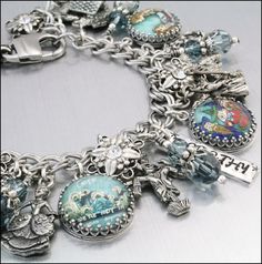 Wizard of Oz Jewelry Silver Charm Bracelet by BlackberryDesigns, $87.00 Themed Silver Jewelry With Charms, Themed Silver Jewelry With Dangling Charms, Whimsical Silver Dangling Charms, Themed Charm Bracelet For Jewelry Making, Whimsical Silver Jewelry With Vintage Charm, Collectible Themed Silver Jewelry, Whimsical Silver Bracelet Jewelry, Themed Silver Collectible Jewelry, Whimsical Nickel-free Silver Charm Bracelet