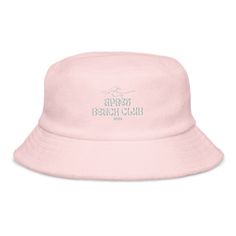 Apres Beach Club 2024 Unstructured terry cloth bucket hat, summer hat, girls trip weekend, bachelorette party favor, gift for mom Complete your warm weather fits with the ultimate beachwear staple--the unstructured terry cloth bucket hat! This versatile headpiece is made of unique terry cloth fabric that's both trendy and comfortable and has a classic brim with decorative stitching. Style the hat with your swimwear, sundress, or basically any casual and effortless outfit. * 100% terry cotton * C Vacation Bucket Sun Hat, Pink Curved Brim Bucket Hat For Beach Season, Pink Bucket Hat For Beach Season, Summer Hats For Bachelorette Party, Summer Gift Wide Brim Bucket Hat, Summer Bucket Hat With Curved Brim As Gift, Summer Gift Bucket Hat With Curved Brim, Summer Curved Brim Bucket Hat, Sailor Hat