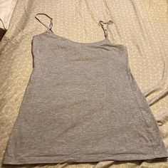 Light Gray, Never Worn, Women’s Large. 95% Cotton 5% Spandex. Spaghetti Straps. Never Worn! Casual Gray Tank Top With Built-in Bra, Basic Fitted Tops With Adjustable Straps, Fitted Gray Summer Camisole, Gray Stretch Summer Camisole, Summer Stretch Gray Camisole, Gray Stretch Camisole For Summer, Summer Gray Top With Built-in Bra, Casual Stretch Camisole With Spaghetti Straps, Gray Tops With Built-in Bra For Summer