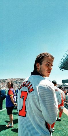 a baseball player standing on top of a field