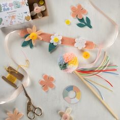 Creative kids, who love imaginative play and dressing up, will adore this clever DIY kit. It features everything they need to make a fabulous felt flower crown and a pompom wand with a ribbon tassel. Felt flowers, in white, peach, pale yellow and pink, and green felt leaves, to sew, with a soft mustard cotton thread, onto the crown's pink felt panel The crown has a pale pink ribbon tie Natural wooden dowel wand with 5 colored ribbon tassel Yellow and dusty pink pompoms to attach to the flowers P Flower Crown Craft, Felt Flower Crown, Ribbon Tassel, Felt Crown, Diy Flower Crown, Crown Crafts, How To Make A Pom Pom, Felt Flower Headband, Felt Leaves