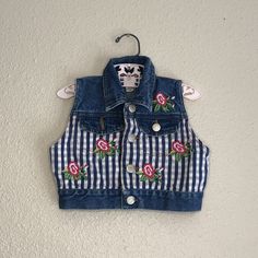 Vintage 90s floral denim jean vest. Maker- Youngstreet Size- 2t Length- 10 1/2 in  Width- 11 1/2 in ptp Excellent vintage condition. May be missing one decorative button on pocket or came this way. Pink C 0356 Girls Vest, 90s Floral, Jean Vest, Floral Denim, Etsy Instagram, Vest Outfits, Fort Collins, Winter 2024, Jean Jackets