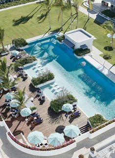 an aerial view of a pool and patio area