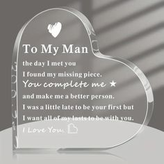 a glass heart with the words to my man on it