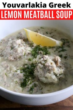 a white bowl filled with meatballs and lemon next to a wooden cutting board that says, youvarlaka greek lemon meatball soup