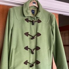 Beautiful, Like New Gap Wool Blend Pea Coat. Gorgeous Pea Green Color With Four Tortoise Shell Toggle Closures. Also Has Inner Zipper. Two Front Pockets. Fully Lined. Only Worn Once! Green Wool Coat, Green Corduroy, Gap Jacket, Gap Jackets, Green Wool, Pea Coat, Tortoise Shell, Long Coat, Wool Coat