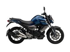 a blue and black motorcycle is shown on a white background in this image, it appears to be from the side