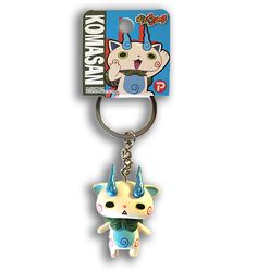 a keychain with a cartoon character on it's front and back sides