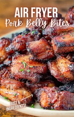 A white plate on a wooden surface, piled high with air fryer pork belly bites. Air Fryer Pork Belly, Pork Belly Bites, Air Fryer Recipes Pork, Pork Belly Recipes Crispy, Pork Bites, Fried Pork Belly, Air Fryer Pork, Pork Belly Slices, Pork Belly Recipes