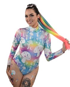 Take the ultimate trip in our Stellar Shrooms print long sleeve bodysuit. The sleek turtleneck design is made with a super stretchy, athleisure inspired fit in mind. This is a one-piece for any season, that's easy to wear and super comfortable. The entire front panel is double-lined, and features a snap closure for easy changing. Washing instructions: Hand washable and machine washable, do not soak for a long time, do not bleach. Material: 90% polyester+10% spandex This print is a Lunautics excl Festival Glitter, Face Jewels, Turtleneck Long Sleeve, Halloween Hair, Halloween News, Clip In Extensions, Ponytail Hairstyles, Long Sleeve Bodysuit, Fit In