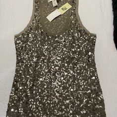 Sleeveless Sequins Top Spring Sequined Stretch Tank Top, Stretch Sequined Tank Top For Spring, Sequined Fitted Vest For Spring, Fitted Sequin Vest For Spring, Spring Party Stretch Vest, Spring Tank Vest For Night Out, Spring Sleeveless Sequin Vest, Spring Sequin Sleeveless Vest, Elegant Sequined Vest For Spring