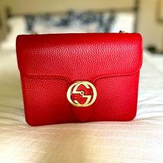 Brand New, Never Used Still With Packaging, Dust Bag And Box Red Shoulder Bag With Gold Hardware Length- 8” Height- 6.25” Classic Gucci Shoulder Bag With Gold-tone Logo Plaque, Gucci Dollar Calfskin Interlocking, Luxury Red Shoulder Bag With Turn-lock Closure, Luxury Red Shoulder Bag With Cc Turnlock Closure, Red Shoulder Bag, Bags Gucci, Gucci Bags, Continental Wallet, Gold Hardware