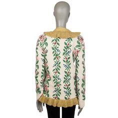 For Sale on 1stDibs - Gucci intarsia floral jacquard knit cardigan in cream, green, rose, magenta, blue, black, and gold wool (100%), metal fibers (54%), and nylon (48%). With Gucci Long Sleeve Cream Outerwear, Gucci Cream Long Sleeve Outerwear, Gucci Cream Winter Outerwear, Fitted Designer Gucci Sweater, Designer Fitted Gucci Sweater, Gucci Long Sleeve Sweater For Spring, Elegant Gucci Sweater For Winter, Gucci Multicolor Fall Outerwear, Gucci Multicolor Outerwear For Fall