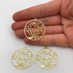 2pcs Raw Brass Cloud Crescent Moon Stars Earring Charm Pendant, Round Crescent Cloud Wind Charm, Laser Cut Earring Findings RW-1095 Size information is shared below Material; Brass Size: 30x32.50mm Hole Size: 1.70mm Plating: Raw Quantity: Optional If there is any other product you are interested in, please check our site below; All of our products are designed and manufactured by us. If you want to order more products in stock, you can freely contact us. Our Products; -Nickel-free -Lead-free -Hi Gold Celestial Round Earrings, Celestial Gold Round Earrings, Metal Round Earrings With Charms, Wind Charm, Laser Cut Earring, Earring Charm, Laser Cut Earrings, Moon Stars, Earring Findings