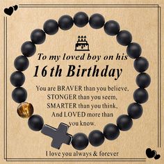 a black beaded bracelet with an image of a cross and the words to my loved boy on his 16th birthday