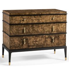 an antique chest of drawers with brass handles