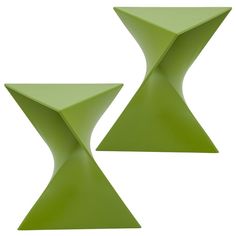 two green tables sitting next to each other