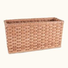 an empty basket is shown on a white background and it's brown woven material