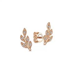 Gabriel & Co. Gold Diamond Leaves Stud Earrings Style Number: EG13572K45JJ Division: Gaby Collection: Floral Style: Stud Starting Price: $625.00 USD* Carat Weight: 0.07ct Width: 6.00mm Thickness: 2.00mm In a nod to Mother Nature, these charming stud earrings feature curving branches of 14k gold punctuated by shimmering diamond leaves. Finished with elegant milgrain detailing, these stylish 0.07ct diamond earrings will enhance any outfit with modern glamour. All Dimensions are approx. *The possib Formal 14k Rose Gold Diamond Earrings, Luxury Rose Gold Earrings With Rose Cut Diamonds, Luxury 14k Rose Gold Earrings, Elegant 14k Rose Gold Diamond Earrings, Elegant Rose Gold Diamond Earrings With Rose Cut, Elegant Rose Gold Rose Cut Diamond Earrings, Luxury Rose Gold Diamond Earrings For Anniversary, Formal Rose Gold Earrings With Rose Cut Diamonds, Luxury Rose Gold Earrings For Anniversary