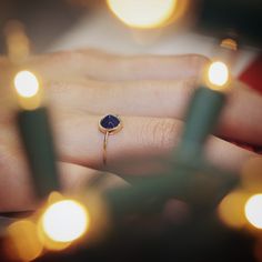 Striking lapis lazuli ring with a spike, unique gold ring, statement ring. The ring is 100% handcrafted in 14k gold. The stone is in bezel hammered setting In the back of the ring there is tiny heart cut out. This ring can be a wonderful Birthday or holiday gift for a Woman. CENTRAL STONE: *natural lapis lazuli *shape: round peaked stone *color: purple/blue *stone with setting: 7.4mm SPECIFICATIONS: *band: 1 mm, high polish *material: 14k yellow gold (this ring is also available in 14k rose or w Fine Jewelry Lapis Lazuli Rings For Gifts, Lapis Lazuli Gemstone Ring For Gift, Lapis Lazuli Gemstone Rings As Gift, Gold Lapis Lazuli Ring As Gift, Gold Lapis Lazuli Ring For Gift, Unique Ring Designs, Unique Gold Rings, Heart Cut Out, Lapis Lazuli Ring