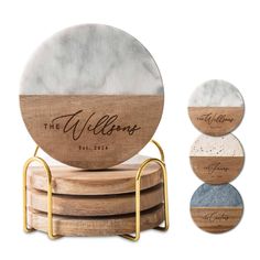 three wooden coasters with marble and gold accents, one on top of the other