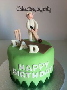 a birthday cake with a man holding a baseball bat