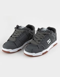 Dc Shoes Stag Shoes. The Stag Pays Homage To Dc's Game-Changing Shoes Of The Early 2000s With Oversized Puff And Technical Design. The Durable Cupsole And Dynamic Upper Construction Of The Stag Put It In A Class Of Its Own. Injected Tpr Logo. Molded Tpr Eyestay. Mesh Collar. Medial Perforations For Breathability. Foam Padded Tongue And Collar For Added Comfort And Support. Dc's Trademarked Pill Pattern Tread. Cupsole Construction. Imported. Mid-top Skate Shoes For Skateboarding, Dc Shoes Y2k, Stag Outfits, Tenis Dc Shoes Anvil, Dc Shoes Pure High Top, Dc Skate Shoes Journeys, Wwe T Shirts, The Stag, Technical Design